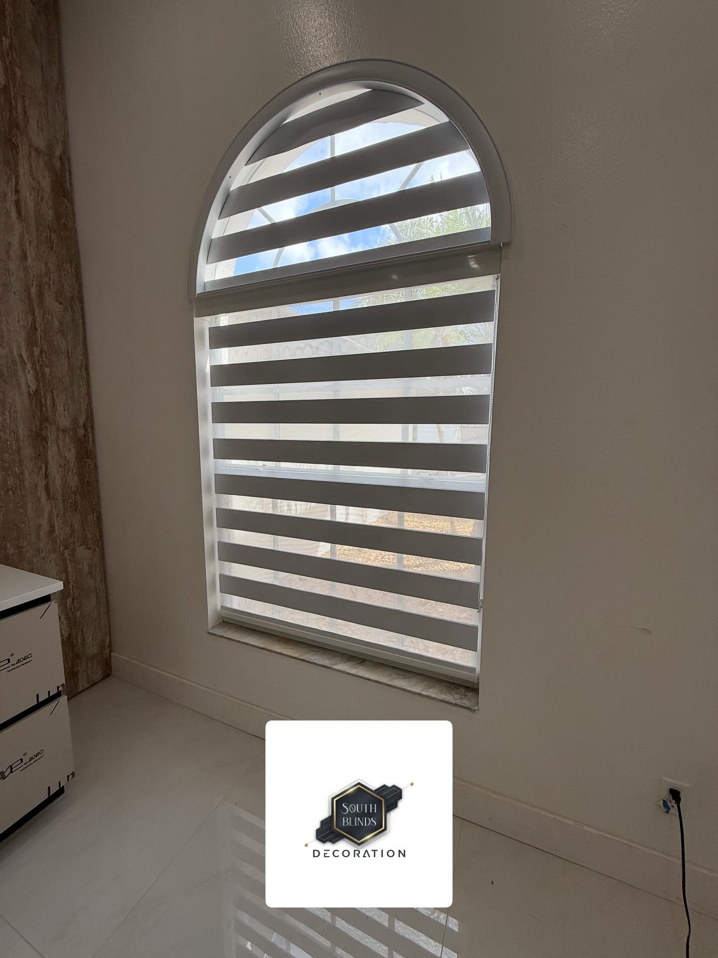 Custom arched zebra blinds in a Wesley Chapel home