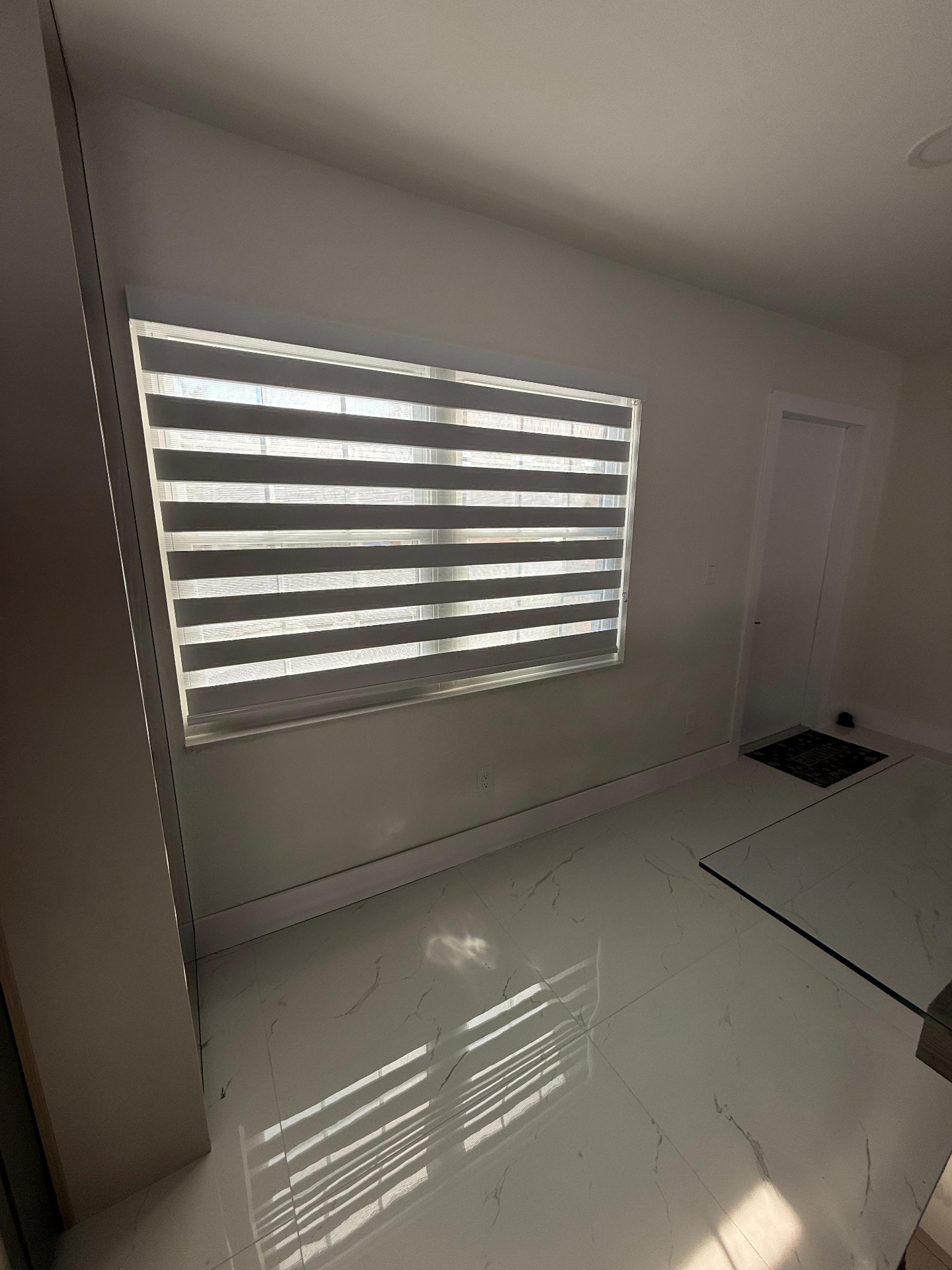 Motorized smart blinds installed in a Tampa luxury bedroom
